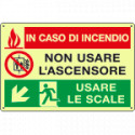 Cartello PVC luminesc. In caso di incendio discesa sinistra EN ISO 7010